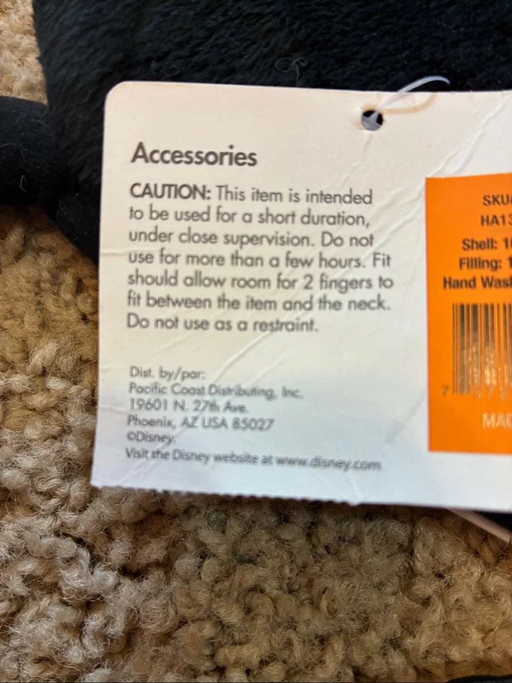 Disney Black Plush Mouse Ear Headband with Orange Tag for dogs.